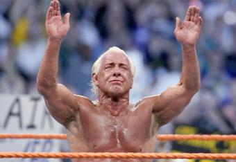 Ric Flair after his retirement match at WrestleMania 24 holding his hands up to say goodbye