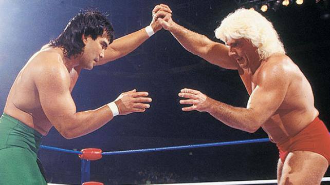 Steamboat and Flair during a match fixing to head off