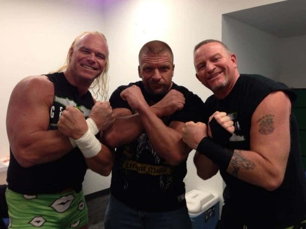 The New Age Outlaws, Billy Gunn and Road Dogg with their Kliq 'friend', Triple H