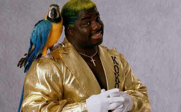 Koko B Ware in a gold jacket with his wrestling animal Frankie the bird on his shoulder