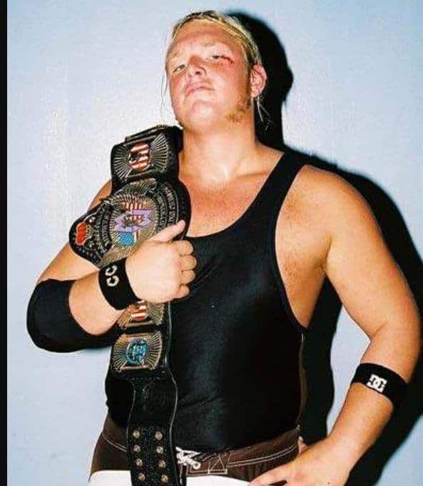 Jonny after retaining his NWA Midweight Championship belt a few weeks after his brother Chris Candido passed away.