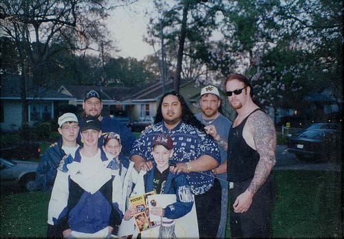 Yokozuna, the Godwinns and Undertaker with 4 young fans back in the '90s