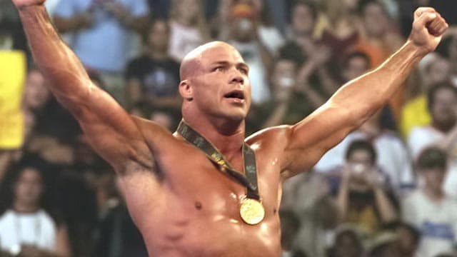 Kurt Angle with a gold medal around his neck