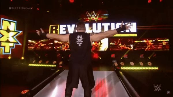 Kevin Owens (back view) entering NXT during his debut