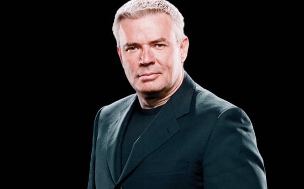 Look no further for a great wrestling podcast! Here's the best in squared circle audio, including some hidden gems and our readers favorite podcasts too. Head shot of Eric Bischoff in a black suit and tshirt