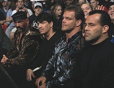 The Radicalz: Perry Saturn, Eddie Guerrero, Chris Benoit and Dean Malenko sitting side by side