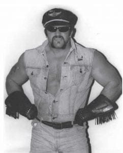 Joe 'Animal' Laurinaitis when he debuted as a single in Georgia as The Road Warrior in late 1982 in a black leather hat and gloves with fringe