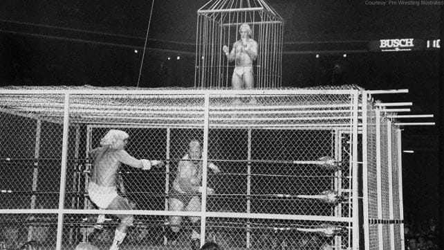 A black and white photo of Tommy Rich, Buzz Sawyer and The Last Battle of Atlanta at the Omni Coliseum, 1983