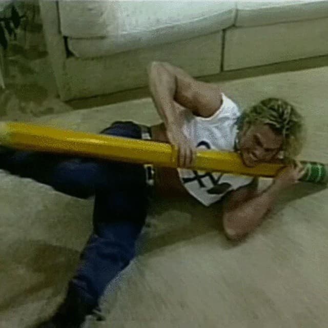 Brian Pillman wrestles a pencil in reference to the bookers ('the men with pencils') on ECW television
