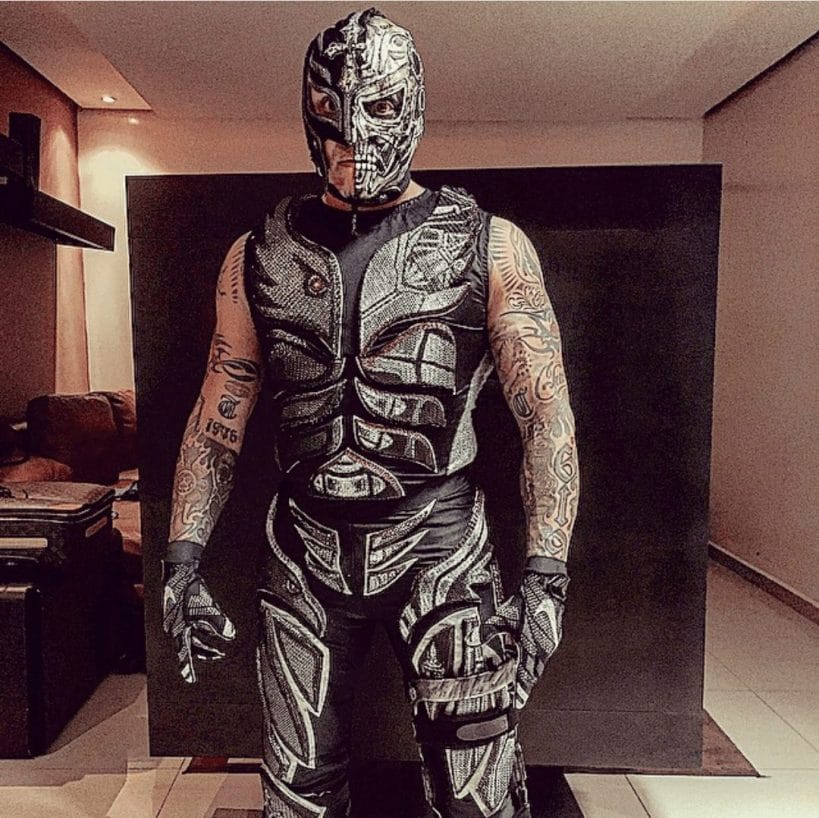 Rey Mysterio - 14 Tributes You May Not Have Noticed! Rey with his Terminator tribute at a AAA event in 2015. The brilliant ensemble includes the classic Rey motifs, whilst incorporating an awesome robotic skeleton design, most noticeably in the half mask (the metallic area around the mouth is actually facepaint).
