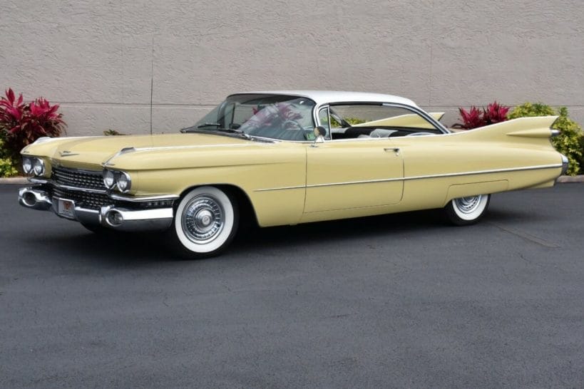 A yellow 1959 Cadillac Coupe Deville, exactly like the one Randy bought for our father Angelo on his 70th birthday.