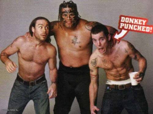 Jackass and Their Strange History With WWE Umaga poses with his two victims, Chris Pontius and Steve-O of Jackass.
