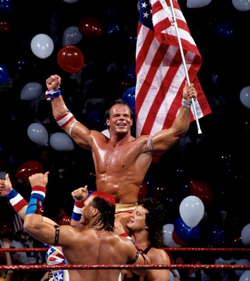 Lex Luger celebrates his countout victory over the Yokozuna alongside fan favorites Tatanka and Scott Steiner of the Steiner Brothers at SummerSlam '93