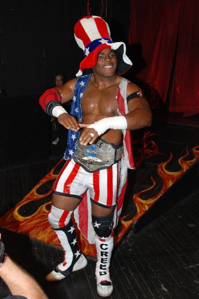 Xavier Woods worked in TNA using a Carl Weathers-inspired Consequences Creed gimmick.