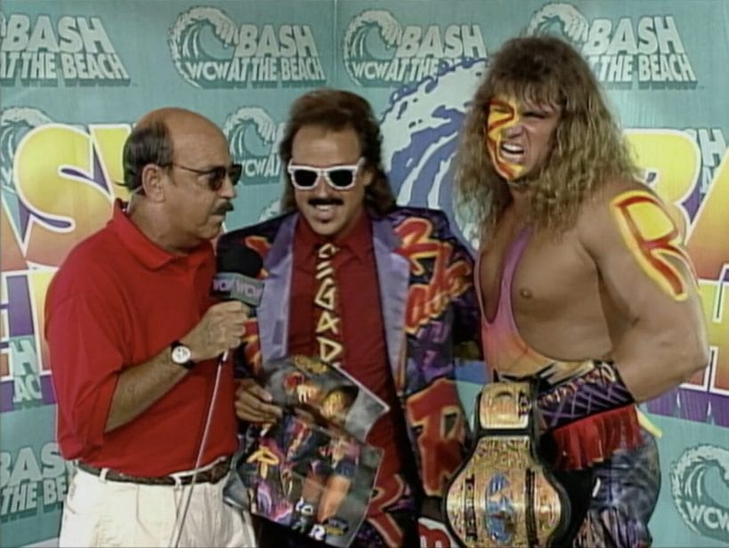 Gene Okerlund, Jimmy Hart, and WCW Television Champion The Renegade at Bash at the Beach 1995.