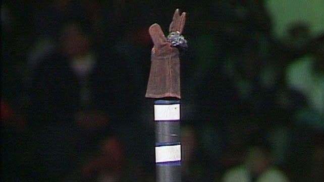The Coal Miner's Glove is hoisted atop a pole before Sting and Jake Roberts face off at Halloween Havoc 1992.