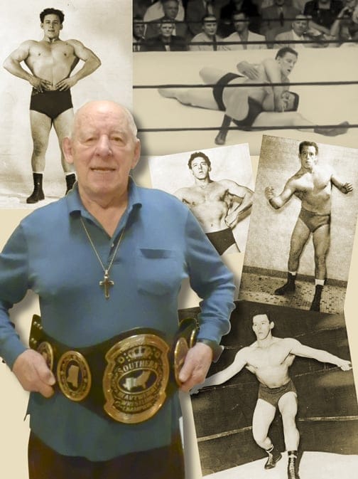 Len Rossi proudly displays the Southern Heavyweight Championship he won on multiple occasions.
