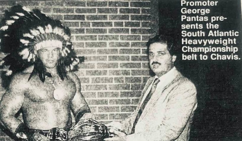 George Pantas presents the South Atlantic Heavyweight Championship title to Chris Chavis (aka Tatanka in the WWF/E).