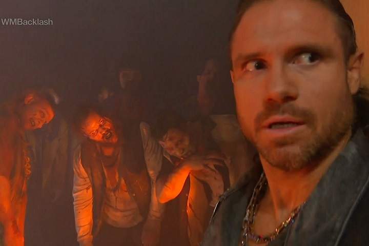 Zombies and Wrestling - 4 Times These Worlds Unusually United John Morrison looks unsteady amongst a sea of zombies at WWE Backlash 2021.