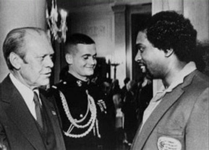 President Gerald Ford greets Allen Coage (Bad News Brown / Allen) at the White House after he made history by capturing bronze in the judo competition at the 1976 Summer Olympics.