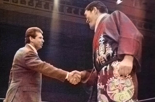 Vince McMahon shaking hands with All Japan Pro Wrestling wrestler and promoter Giant Baba.